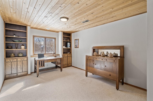 office area with wooden ceiling, carpet, and baseboards