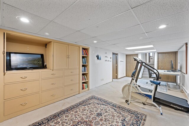 workout room featuring recessed lighting and a paneled ceiling