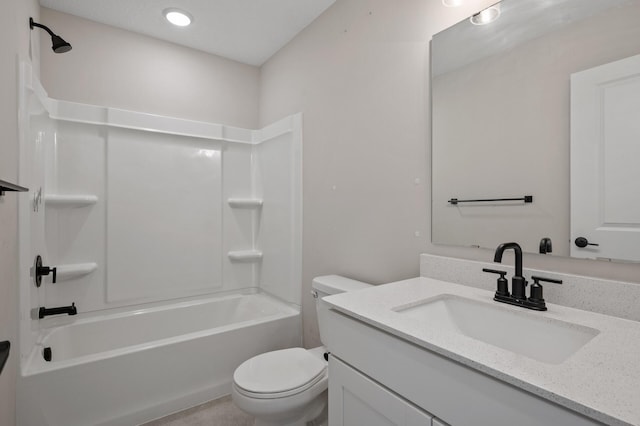 full bath with shower / bathtub combination, toilet, and vanity