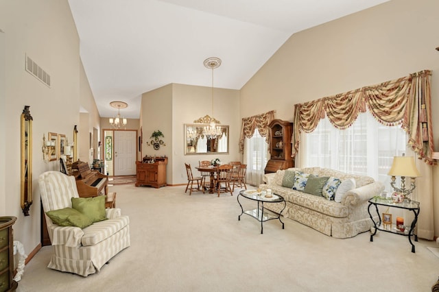 living room featuring visible vents, baseboards, carpet floors, an inviting chandelier, and high vaulted ceiling