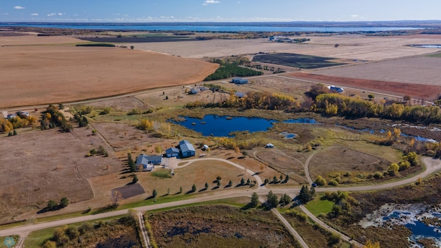 aerial view featuring a water view and a rural view