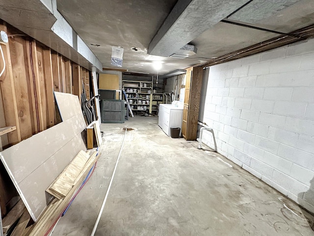 312 4th St E, Jasper, MN 56144 - unfinished basement featuring washer / dryer and concrete block wall