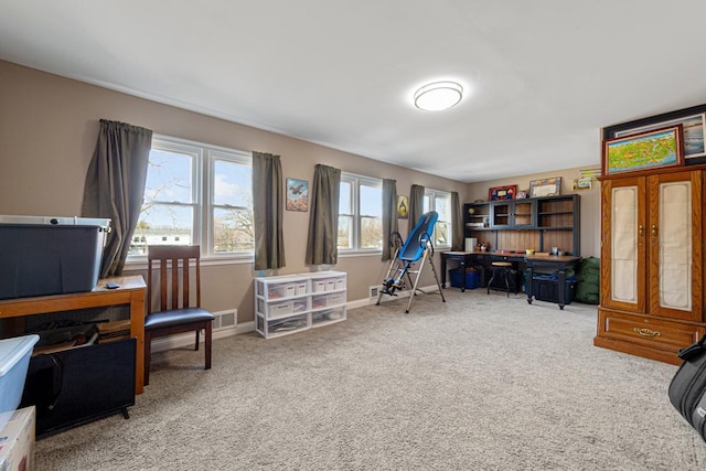 office with carpet, visible vents, and baseboards