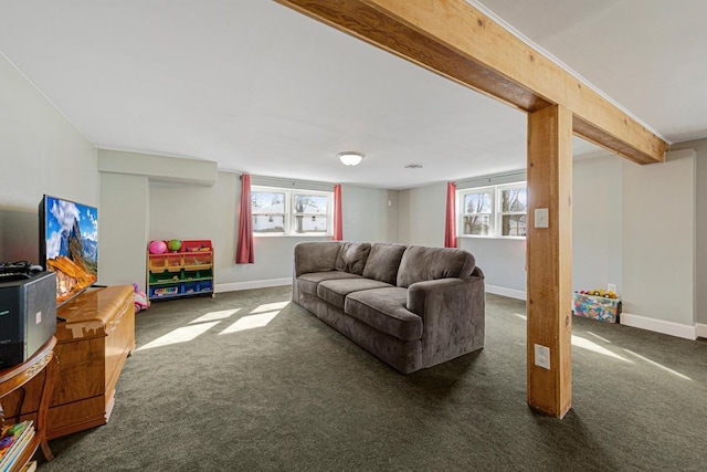 living room with carpet floors, beam ceiling, and baseboards