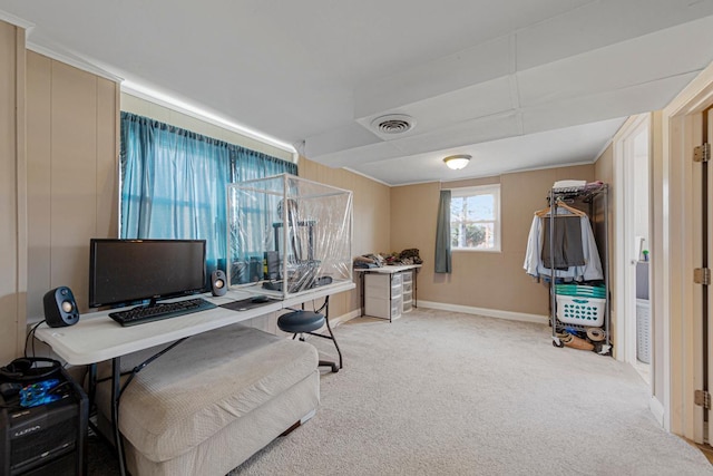 carpeted office space featuring visible vents and baseboards