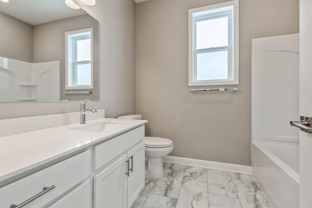 full bath with marble finish floor, toilet, vanity, and baseboards