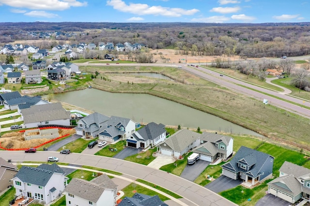 aerial view with a water view and a residential view