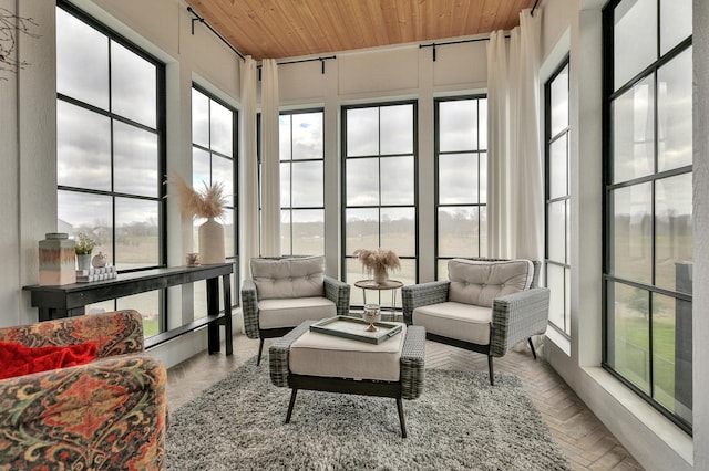 sunroom / solarium featuring wooden ceiling