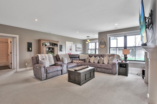 living area featuring recessed lighting, carpet flooring, and baseboards