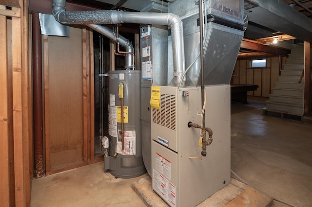 utility room with gas water heater and heating unit