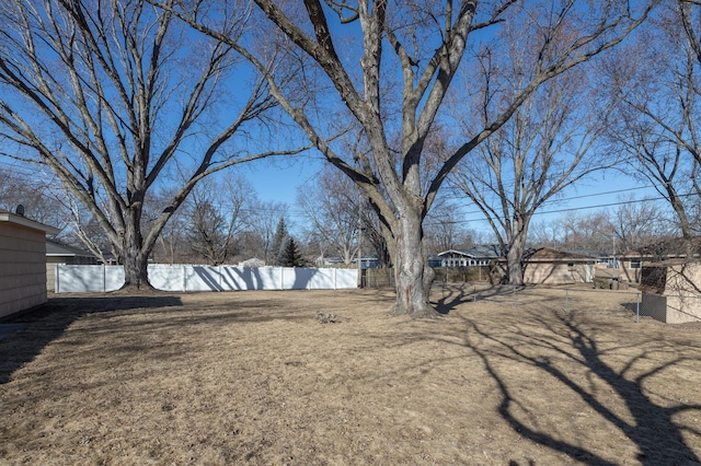 view of yard with fence