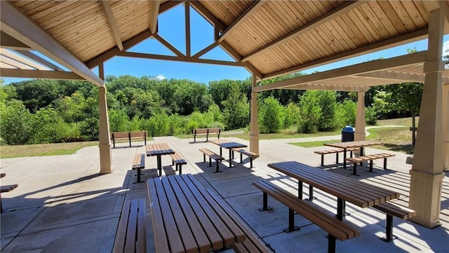 view of community featuring a patio and a pergola