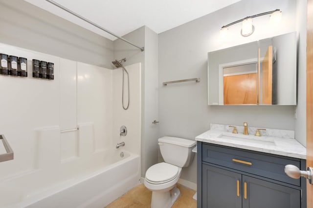 bathroom with tile patterned floors, vanity, bathtub / shower combination, baseboards, and toilet