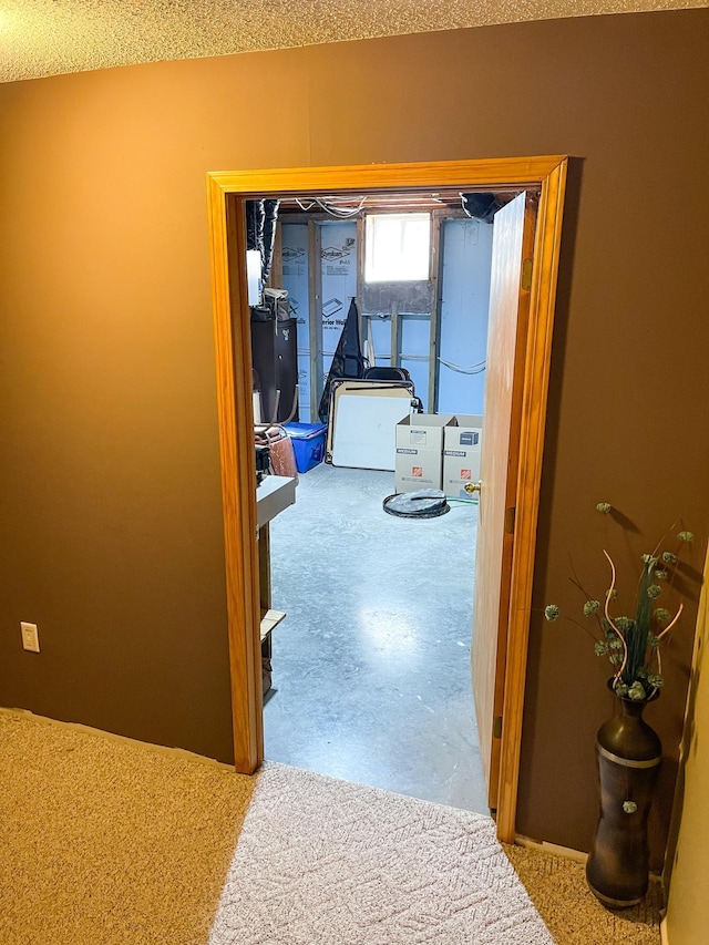 hallway featuring concrete floors