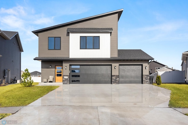 752 Cathy Dr W, West Fargo, ND 58078 - modern home with driveway, fence, cooling unit, a front yard, and a garage