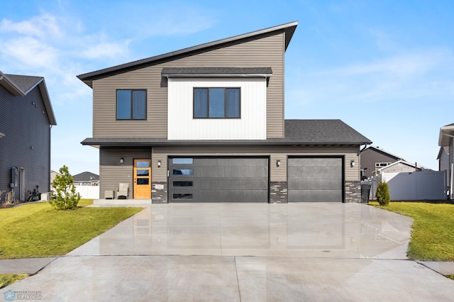 modern home with driveway, fence, cooling unit, a front yard, and a garage