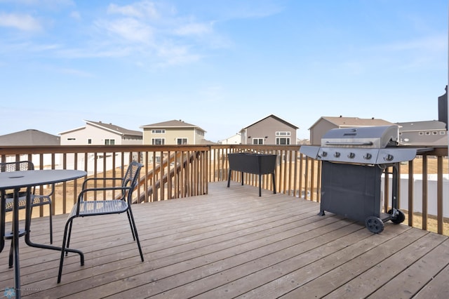 752 Cathy Dr W, West Fargo, ND 58078 - wooden terrace with area for grilling and a residential view