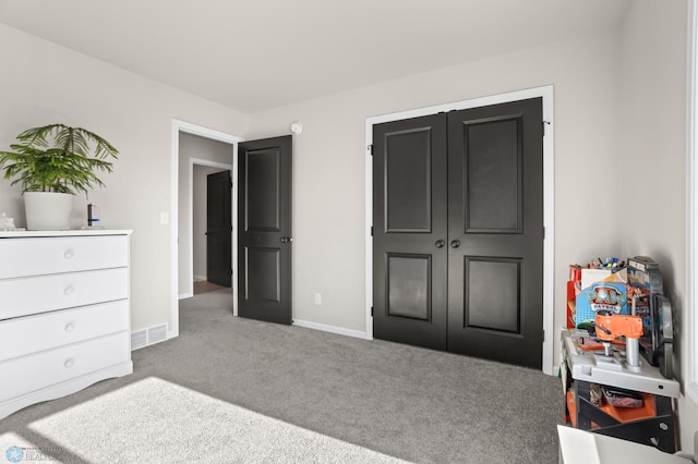 752 Cathy Dr W, West Fargo, ND 58078 - carpeted bedroom featuring baseboards, visible vents, and a closet
