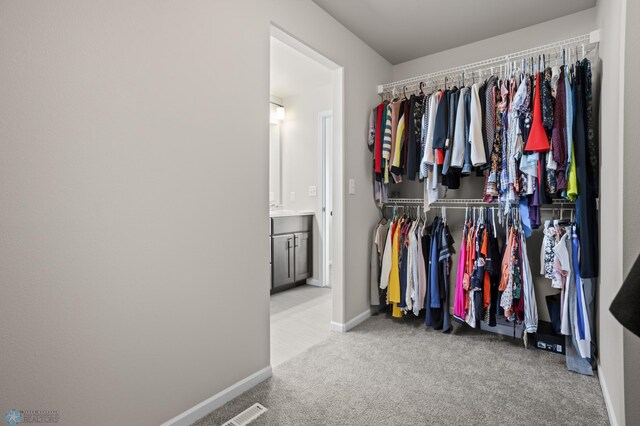 752 Cathy Dr W, West Fargo, ND 58078 - spacious closet featuring carpet floors