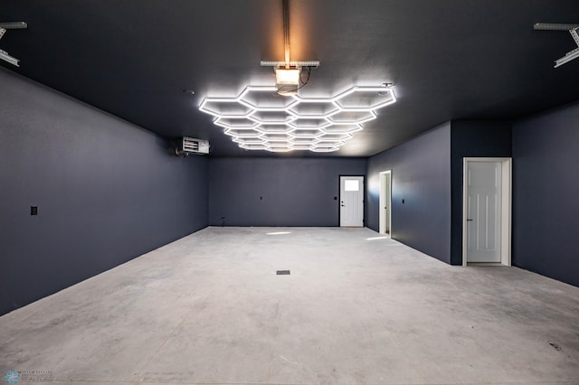 unfurnished room featuring concrete flooring