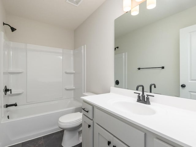 bathroom with washtub / shower combination, visible vents, vanity, and toilet