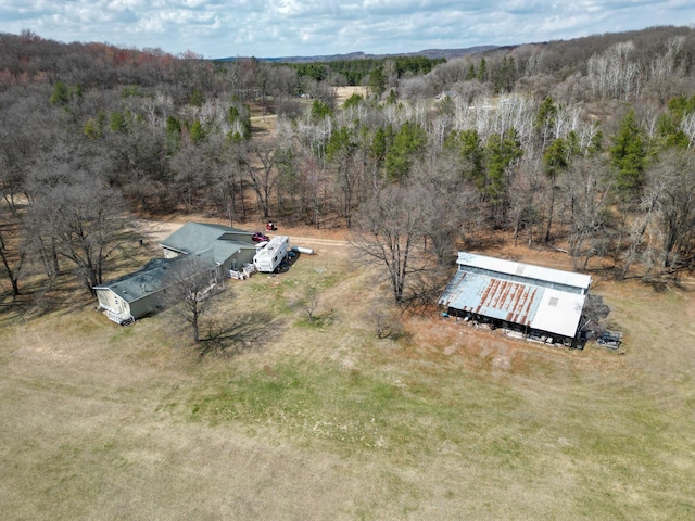 aerial view featuring a view of trees