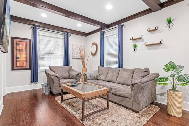 living area featuring recessed lighting, beamed ceiling, wood-type flooring, and baseboards