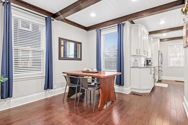 dining area with recessed lighting, dark wood-type flooring, visible vents, baseboards, and beam ceiling