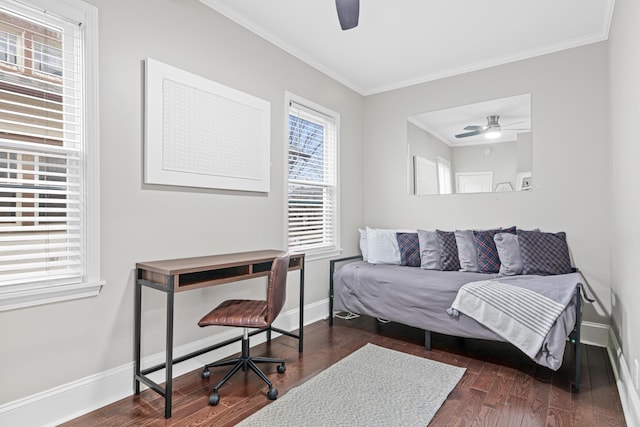 bedroom featuring dark wood-style floors, ornamental molding, baseboards, and ceiling fan