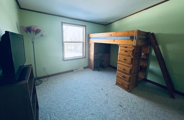 bedroom featuring a textured ceiling, carpet flooring, visible vents, and crown molding