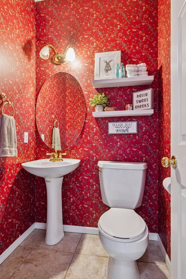 3679 Commonwealth Rd, Woodbury, MN 55125 - half bathroom with baseboards, tile patterned flooring, toilet, and wallpapered walls