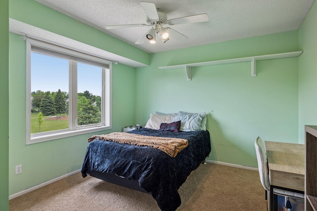 3679 Commonwealth Rd, Woodbury, MN 55125 - bedroom featuring carpet flooring, a ceiling fan, a textured ceiling, and baseboards