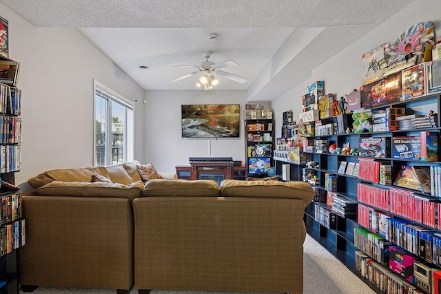 3679 Commonwealth Rd, Woodbury, MN 55125 - living room with ceiling fan, a textured ceiling, and carpet floors