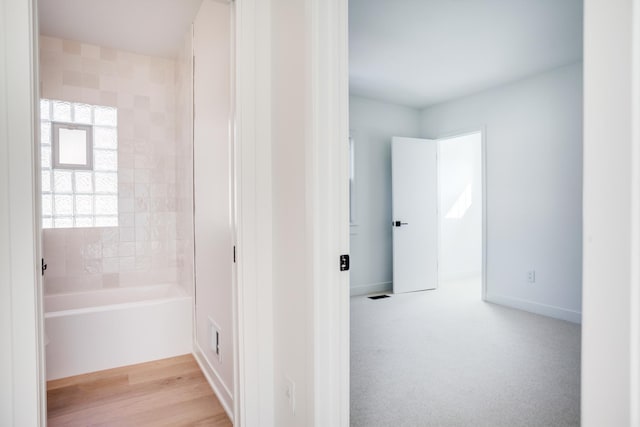 full bath with baseboards