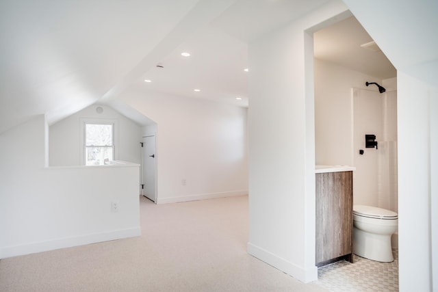 additional living space with recessed lighting, baseboards, light carpet, and vaulted ceiling