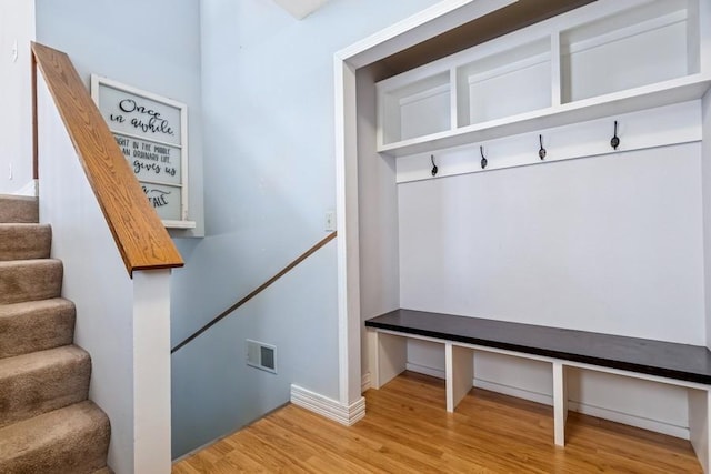 mudroom with light wood-type flooring and visible vents