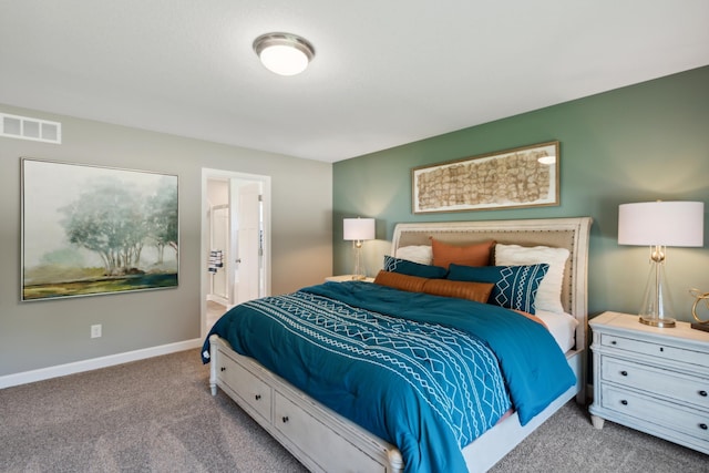 bedroom with carpet, visible vents, and baseboards