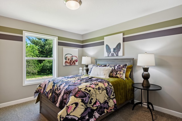 carpeted bedroom with baseboards