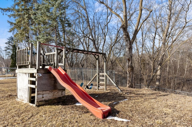 view of jungle gym with fence