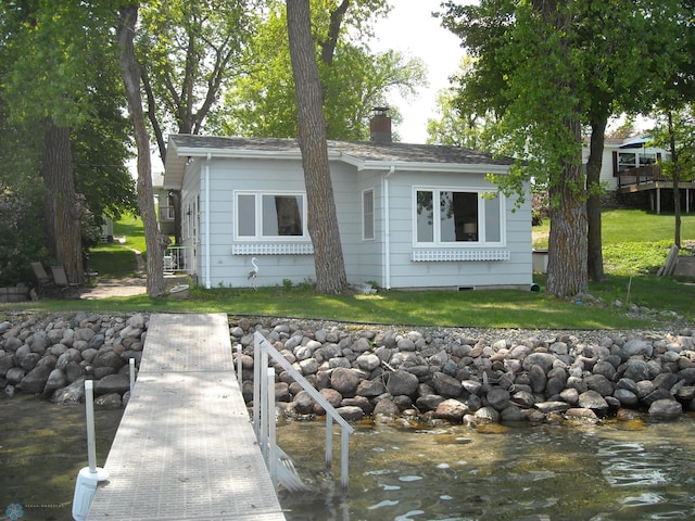 17140 Big Cormorant Rd, Lake Eunice Twp, MN 56511 - rear view of property featuring a chimney and a yard