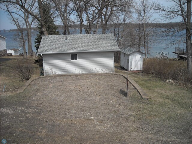 17140 Big Cormorant Rd, Lake Eunice Twp, MN 56511 - garage featuring a shed