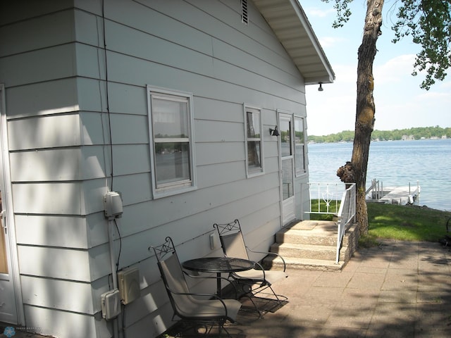17140 Big Cormorant Rd, Lake Eunice Twp, MN 56511 - view of patio / terrace featuring a water view