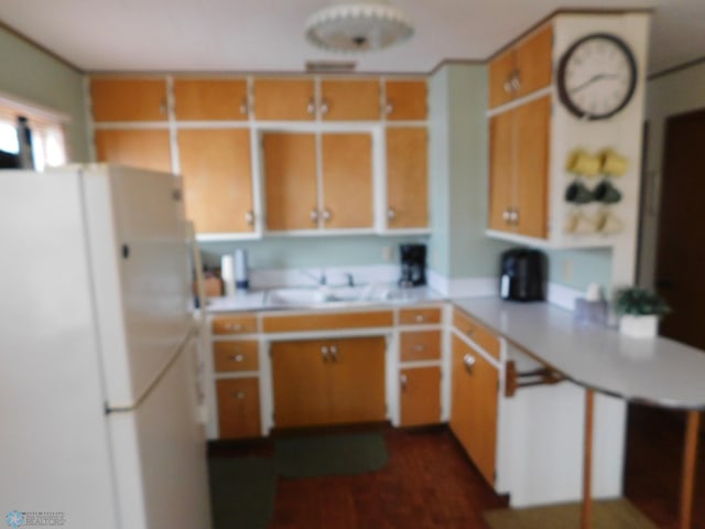 17140 Big Cormorant Rd, Lake Eunice Twp, MN 56511 - kitchen with freestanding refrigerator, light countertops, and a sink