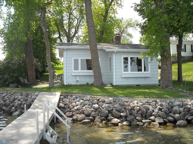 17140 Big Cormorant Rd, Lake Eunice Twp, MN 56511 - back of house with a chimney and a yard