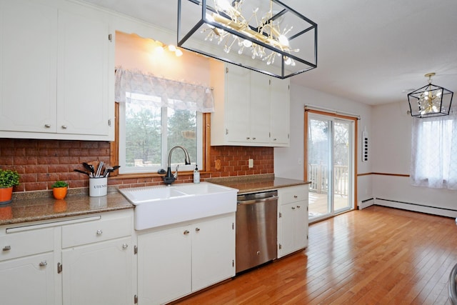 kitchen with dishwasher, a sink, white cabinetry, and light wood-style floors