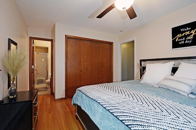 bedroom with a closet, a ceiling fan, and light wood-style floors