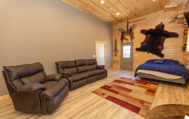 bedroom with high vaulted ceiling, recessed lighting, wood ceiling, and wood finished floors