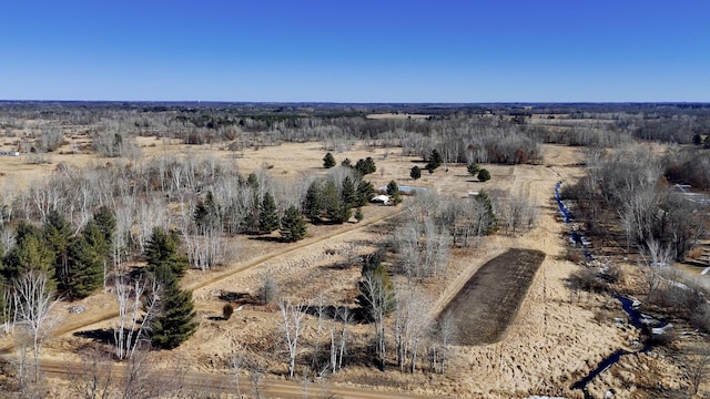 birds eye view of property featuring a rural view