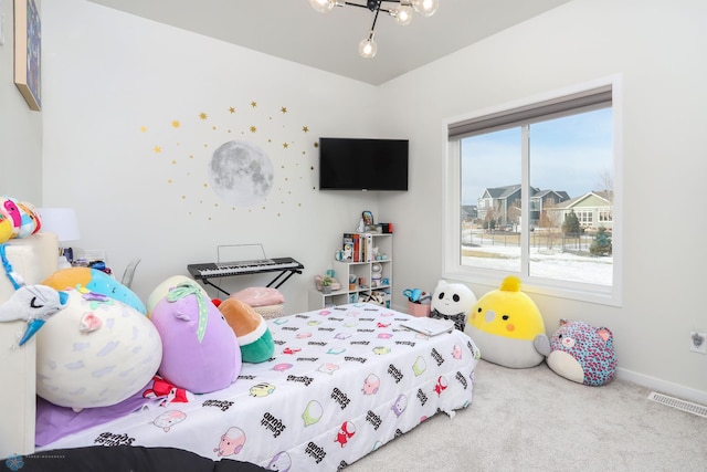 bedroom featuring baseboards, visible vents, and carpet flooring