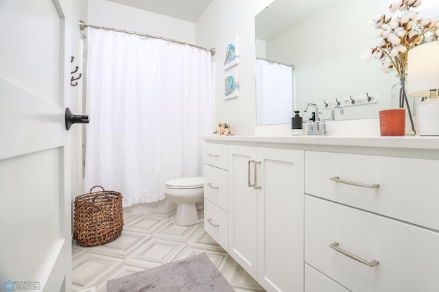 bathroom with toilet, curtained shower, and vanity